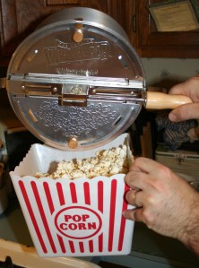Popcorn into the big popcorn bowl